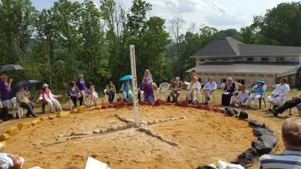 Rev. Laura George begins Peace Pole Ceremony