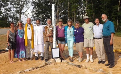 Around the Peace Pole at the Medicine Wheel (from left to right): Rev. Devon Rachelle, Reverend Laura George, J.D., His Excellency Reverend Patrick McCollum, Guruji Sri Yogacharya Arun Kumarji, Glen T. Martin, Ph.D., Eugenia, Ruth Broyde Sharone, Noel Marshall, Ph.D., Bob Warner, Reverend Don Lansky, and Chris Van Cleave